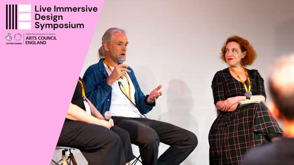 Colin Nightingale and Jane Ensell present onstage at the Live Immersive Design Symposium