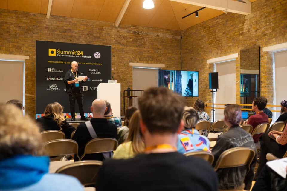 Immersive Experience Network Summit -Speakers on stage